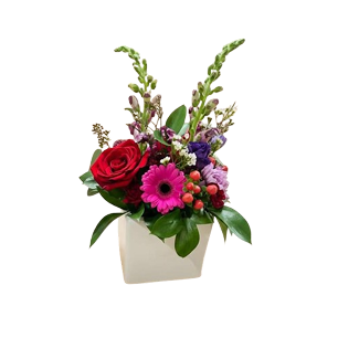 red purple mixed floral arrangement, white vase, Brossard florist